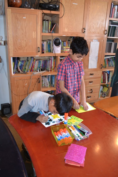 Young students colouring